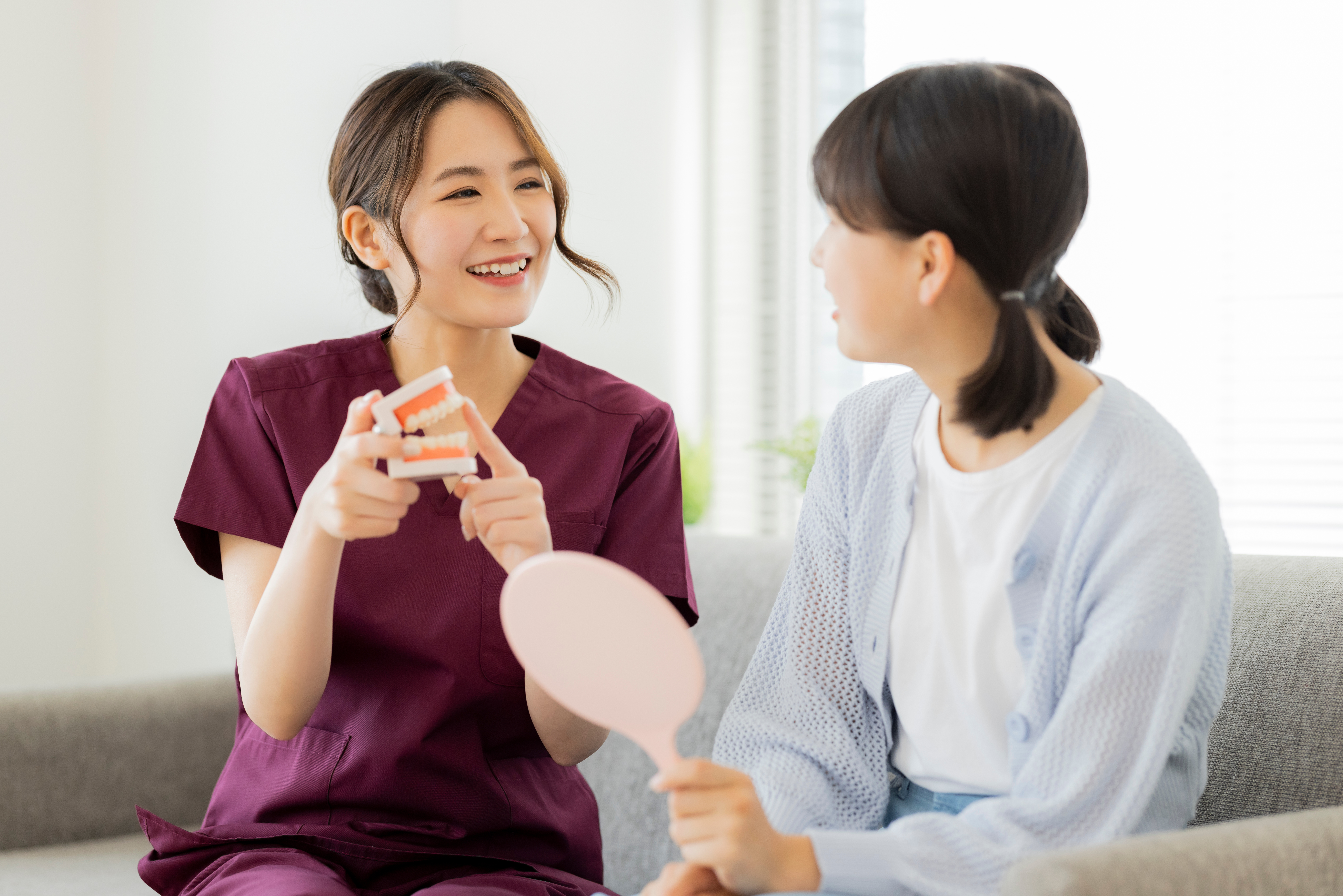 歯科スタッフと患者